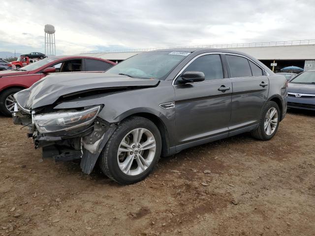 FORD TAURUS SEL 2015 with VIN 1FAHP2E8XFG105790 - Photo from auction
