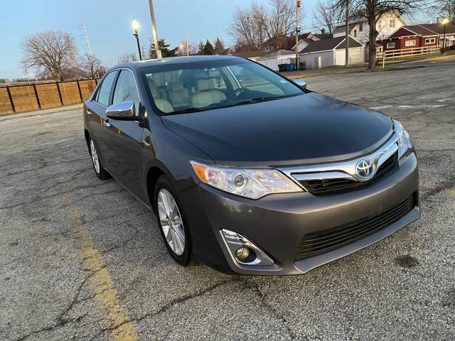 TOYOTA CAMRY HYBR 2014 with VIN 4T1BD1FK4EU138647 - Photo from auction