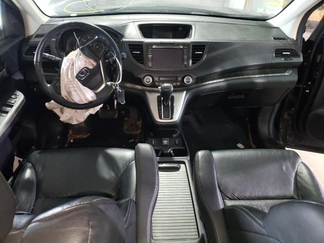 Photo 8 from auction – 2014 HONDA CR-V EXL with VIN 2HKRM4H71EH641009