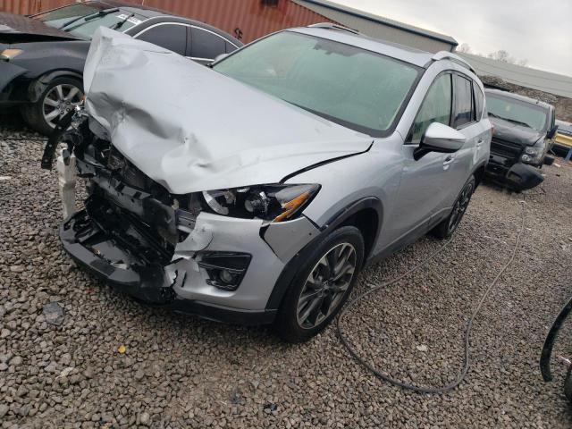 MAZDA CX-5 GT 2016 with VIN JM3KE2DY5G0887019 - Photo from auction