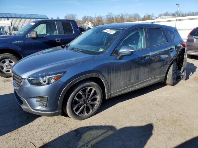 MAZDA CX-5 GT 2016 with VIN JM3KE4DYXG0739721 - Photo from auction