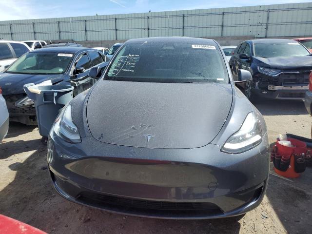 Photo 5 from auction – 2022 TESLA MODEL Y with VIN 7SAYGAEE8NF327220