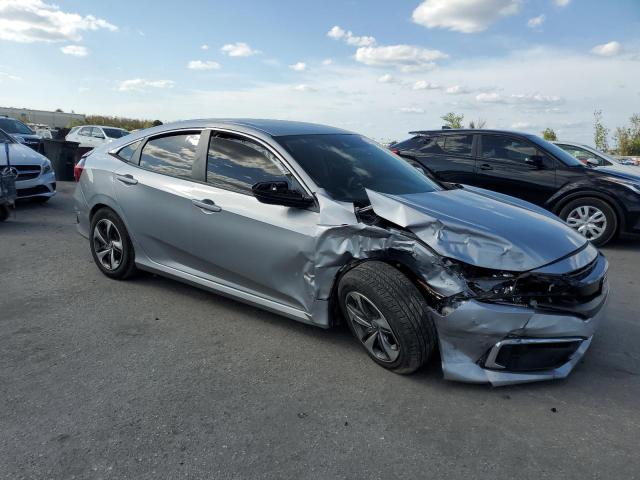 Photo 4 from auction – 2019 HONDA CIVIC LX with VIN 19XFC2F65KE035023