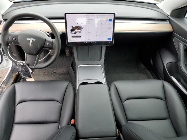 Photo 8 from auction – 2021 TESLA MODEL 3 with VIN 5YJ3E1EA1MF873642