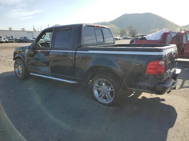 Photo 2 from auction – 2003 FORD F150 SUPER with VIN 1FTRW073X3KC93579
