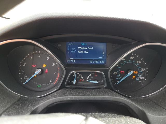 Photo 9 from auction – 2014 FORD FOCUS S with VIN 1FADP3E23EL310647