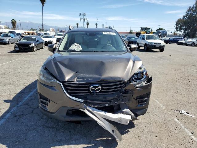Photo 5 from auction – 2016 MAZDA CX-5 GT with VIN JM3KE2DY0G0734046