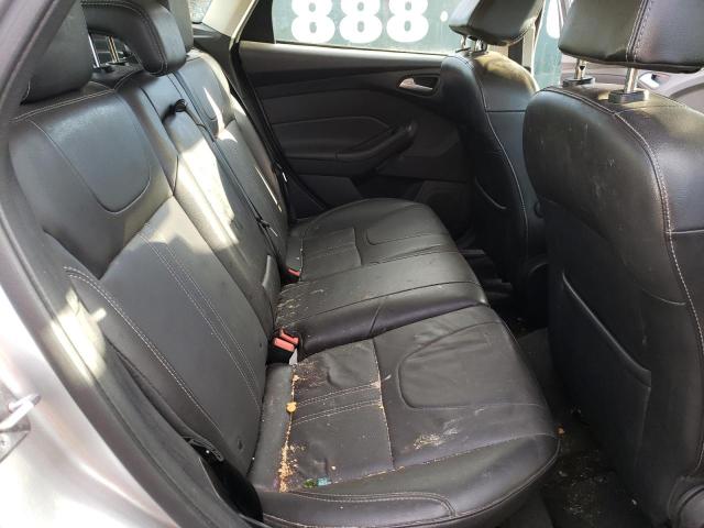 Foto 10 de la subasta – 2014 FORD FOCUS SE con VIN 1FADP3K28EL333460