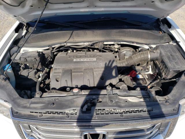 Photo 11 from auction – 2014 HONDA RIDGELINE with VIN 5FPYK1F58EB004772