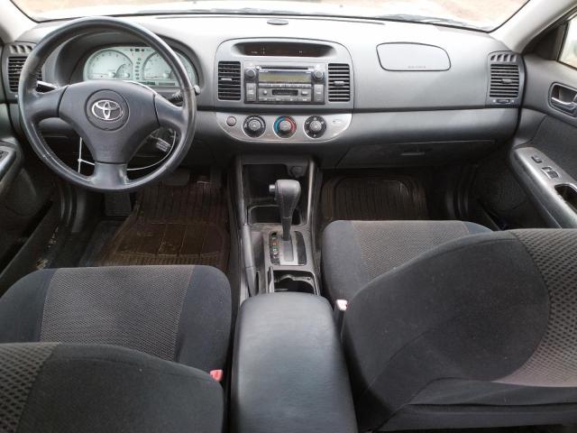 Photo 8 from auction – 2002 TOYOTA CAMRY LE with VIN JTDBF30K520040118