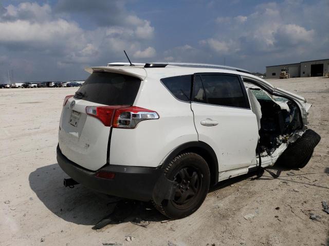 Photo 3 from auction – 2014 TOYOTA RAV4 LE with VIN JTMZFREV4EJ014001