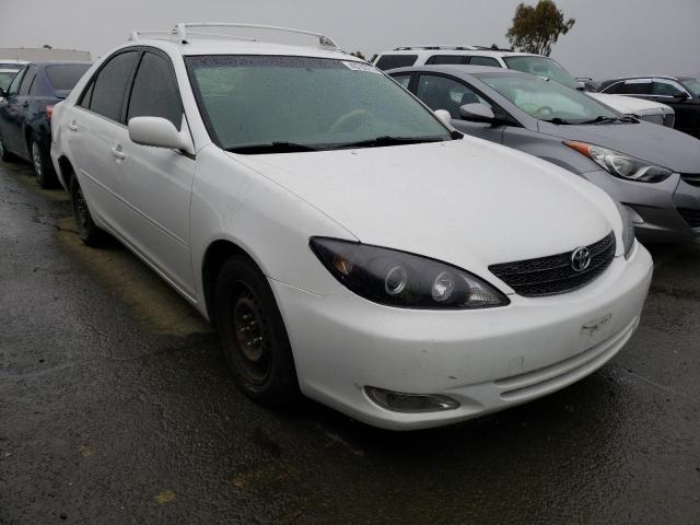 Photo 4 from auction – 2002 TOYOTA CAMRY LE with VIN JTDBE32K220036186
