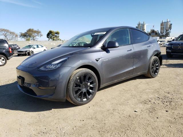 TESLA MODEL Y 2023 with VIN 7SAYGDEEXPA031858 - Photo from auction