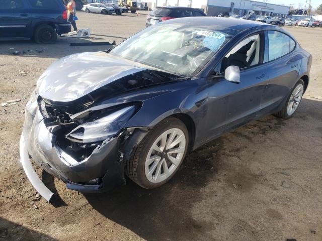 TESLA MODEL 3 2022 with VIN 5YJ3E1EA9NF338074 - Photo from auction