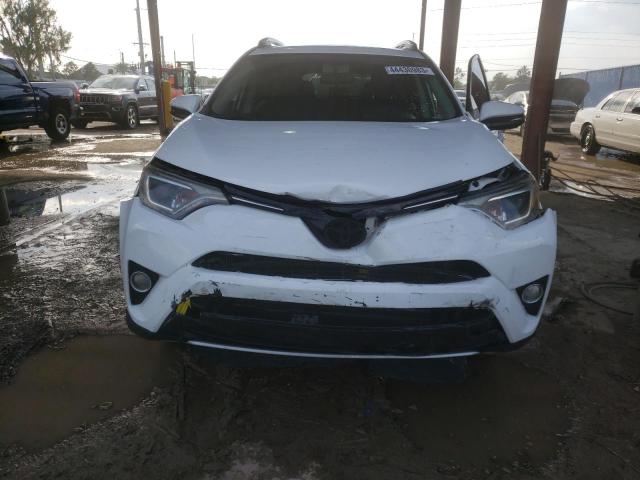 Photo 5 from auction – 2016 TOYOTA RAV4 with VIN 2T3WFREV8GW302725