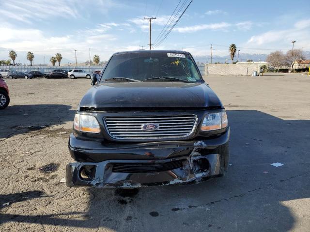 Photo 5 from auction – 2003 FORD F150 SUPER with VIN 1FTRW073X3KC93579