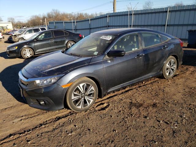 Photo 1 from auction – 2018 HONDA CIVIC EX with VIN JHMFC1F33JX027368