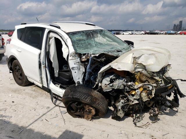 Photo 4 from auction – 2014 TOYOTA RAV4 LE with VIN JTMZFREV4EJ014001