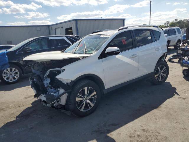 TOYOTA RAV4 XLE 2017 with VIN JTMWFREV8HJ148243 - Photo from auction