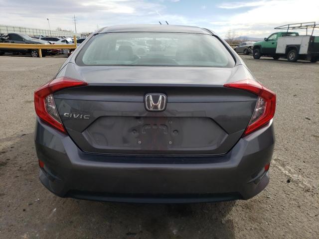 Photo 6 from auction – 2018 HONDA CIVIC LX with VIN 19XFC2F53JE044101