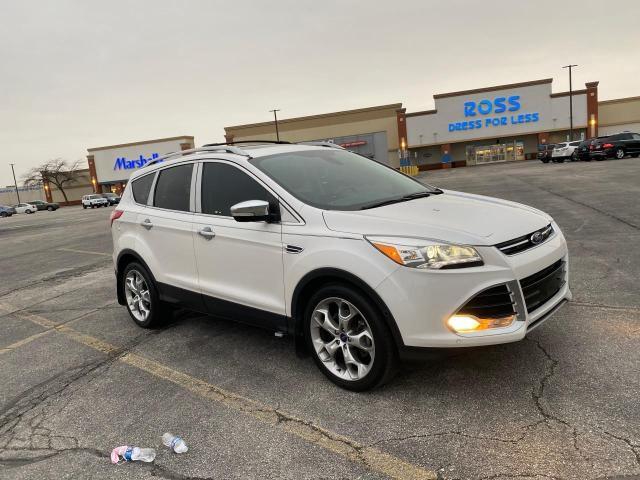 FORD ESCAPE TIT 2014 with VIN 1FMCU0J91EUD92738 - Photo from auction