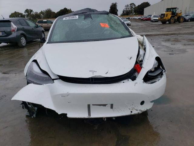 Photo 5 from auction – 2021 TESLA MODEL 3 with VIN 5YJ3E1EA8MF988934