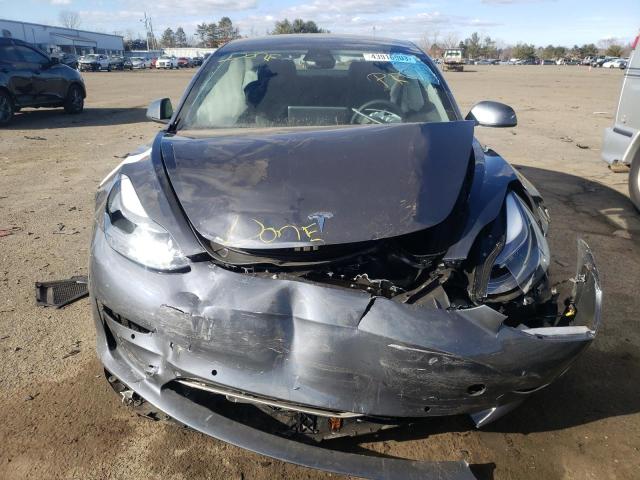 Photo 5 from auction – 2022 TESLA MODEL 3 with VIN 5YJ3E1EA9NF338074