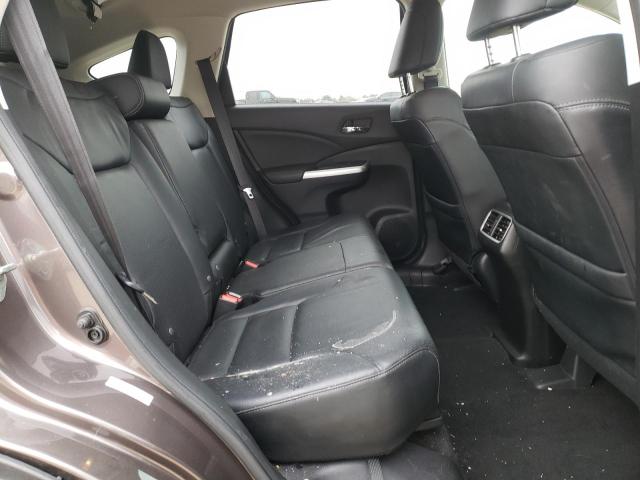 Photo 10 from auction – 2015 HONDA CR-V with VIN 2HKRM3H70FH521987