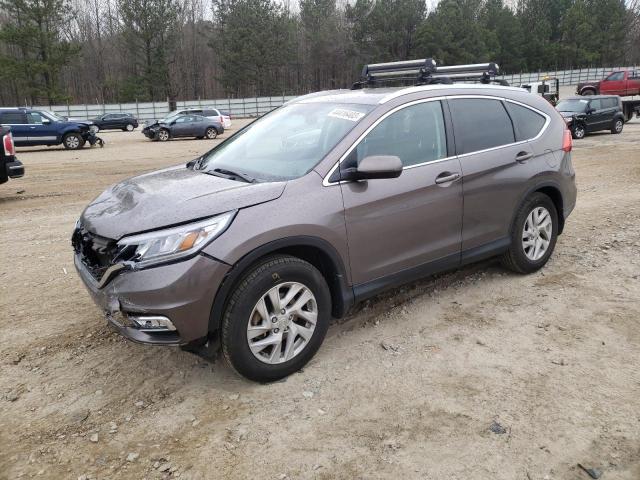 HONDA CR-V 2015 with VIN 2HKRM3H70FH521987 - Photo from auction