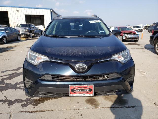 Photo 5 from auction – 2018 TOYOTA RAV4 LE with VIN JTMZFREV1JD115943