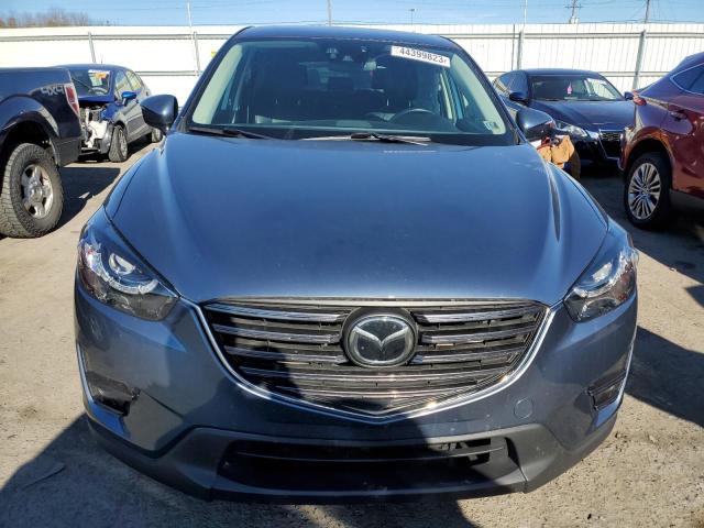Photo 5 from auction – 2016 MAZDA CX-5 GT with VIN JM3KE4DYXG0739721