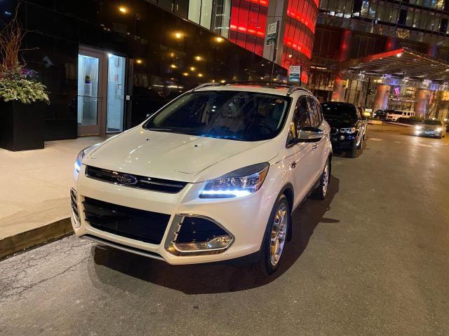 Photo 2 from auction – 2014 FORD ESCAPE TIT with VIN 1FMCU0J91EUD92738
