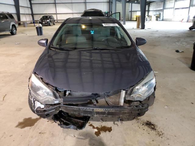 Photo 5 from auction – 2014 TOYOTA COROLLA L with VIN 5YFBURHE9EP142331