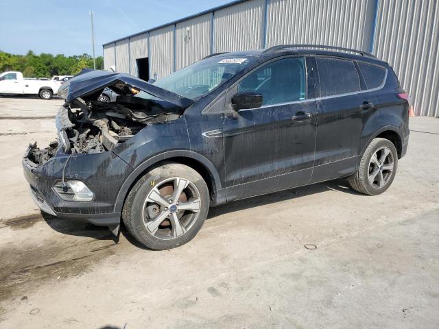 FORD ESCAPE SE 2017 with VIN 1FMCU0G94HUF04556 - Photo from auction