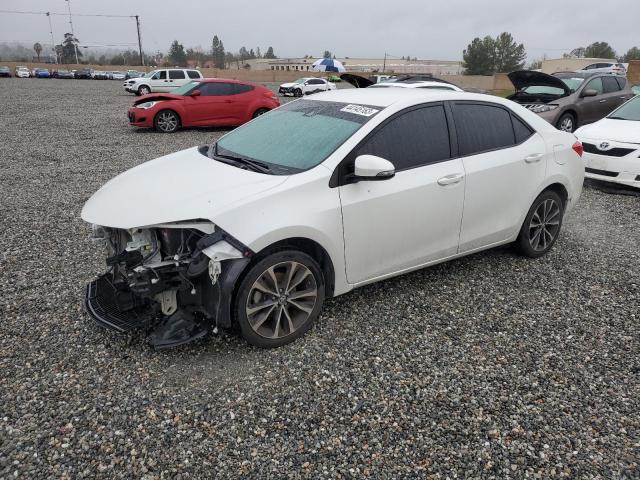 TOYOTA COROLLA L 2018 with VIN 5YFBURHE4JP772462 - Photo from auction