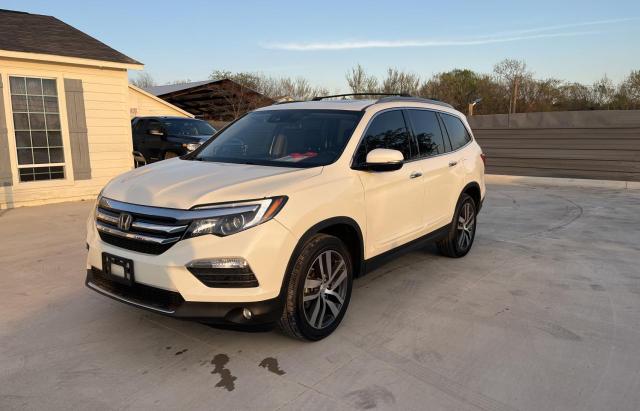 Photo 2 from auction – 2017 HONDA PILOT ELIT with VIN 5FNYF6H08HB040817