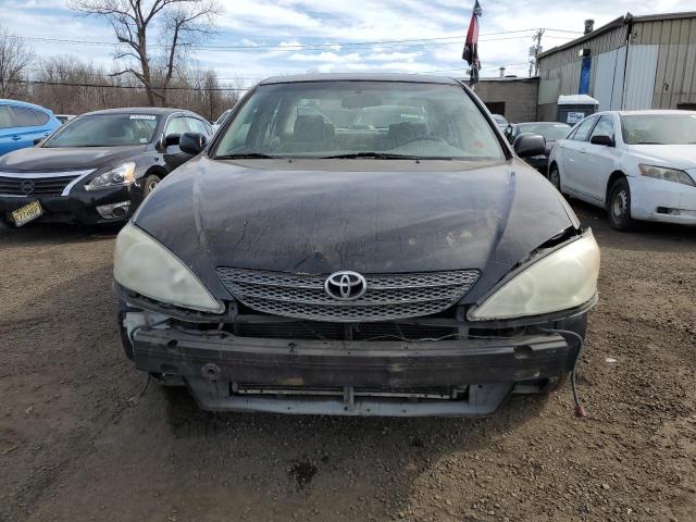 Photo 5 from auction – 2002 TOYOTA CAMRY LE with VIN JTDBE32KX20064933