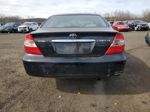 Photo 6 from auction – 2002 TOYOTA CAMRY LE with VIN JTDBE32KX20064933
