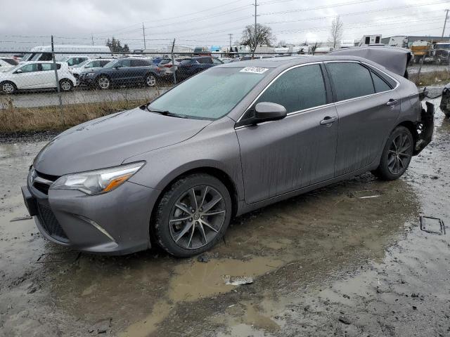 TOYOTA CAMRY LE 2017 with VIN 4T1BF1FKXHU673898 - Photo from auction