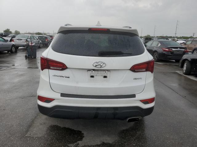 Photo 6 from auction – 2018 HYUNDAI SANTA FE S with VIN 5NMZU3LB8JH101461