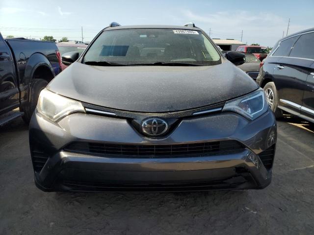 Photo 5 from auction – 2018 TOYOTA RAV4 LE with VIN 2T3ZFREV8JW492031