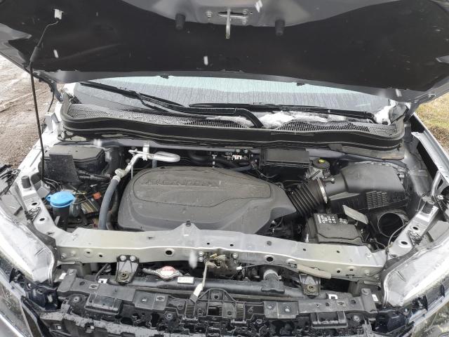 Photo 12 from auction – 2022 HONDA PILOT SE with VIN 5FNYF6H20NB040727