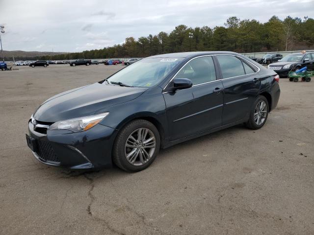 TOYOTA CAMRY LE 2015 with VIN 4T1BF1FKXFU104479 - Photo from auction