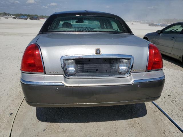 Photo 6 from auction – 2004 LINCOLN TOWN CAR E with VIN 1LNHM81W14Y655733