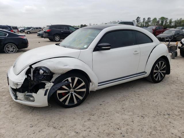 VOLKSWAGEN BEETLE TUR 2012 with VIN 3VWV67AT2CM644927 - Photo from auction