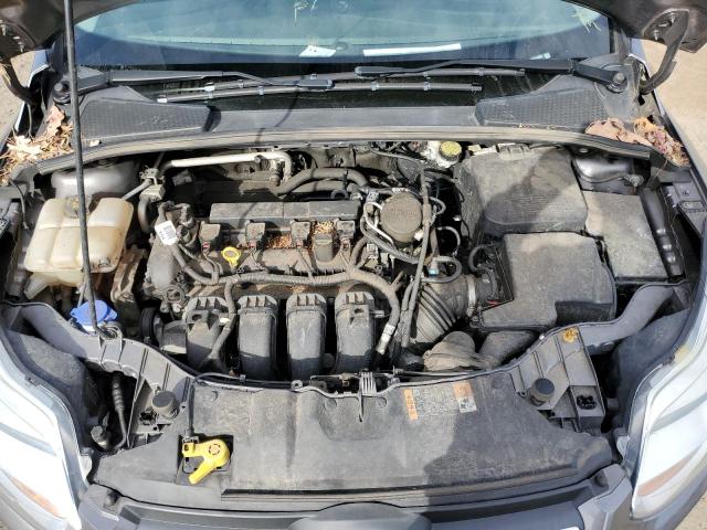 Photo 11 from auction – 2014 FORD FOCUS S with VIN 1FADP3E21EL418393