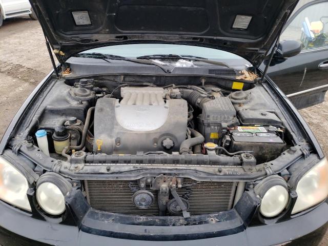 Photo 11 from auction – 2004 KIA OPTIMA LX with VIN KNAGD128245360520