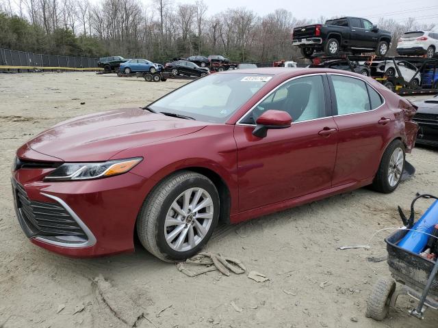 TOYOTA CAMRY LE 2022 with VIN 4T1C11AK3NU657628 - Photo from auction