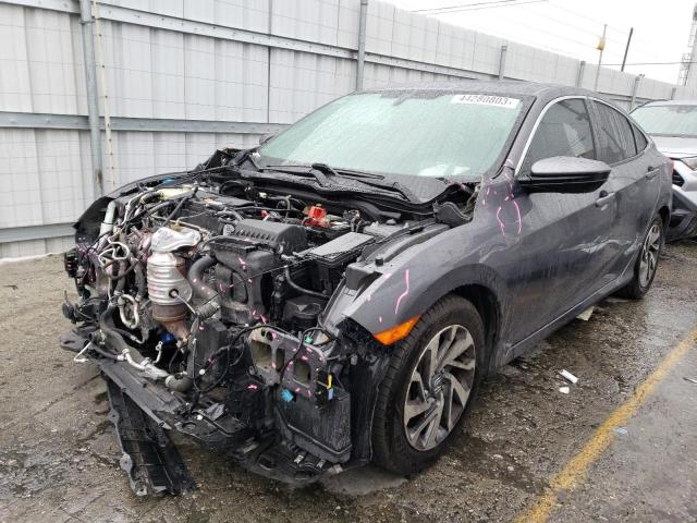 HONDA CIVIC EX 2018 with VIN 2HGFC2F73JH559073 - Photo from auction