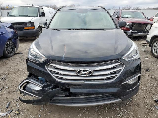 Photo 5 from auction – 2017 HYUNDAI SANTA FE S with VIN 5NMZU3LB8HH012855
